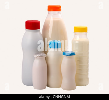 composition of the different types plastic bottles for milk and yogurt, isolated on white Stock Photo