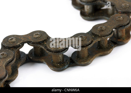 Close up of a rusty bike chain over white Stock Photo
