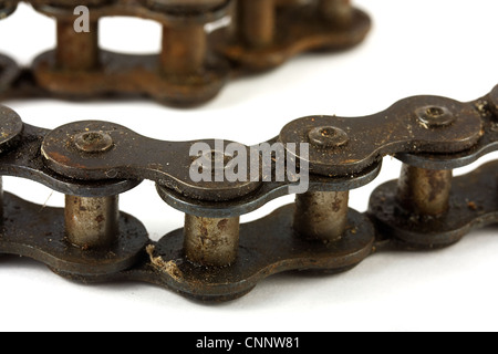 Close up of a rusty bike chain over white Stock Photo