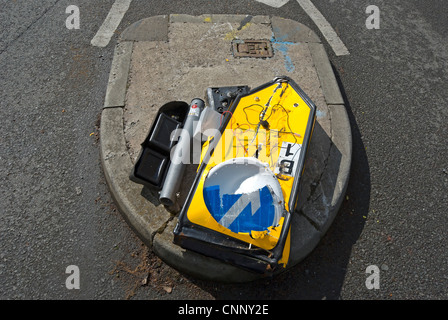 crushed  bollard on traffic island in kingston, surrey, england Stock Photo