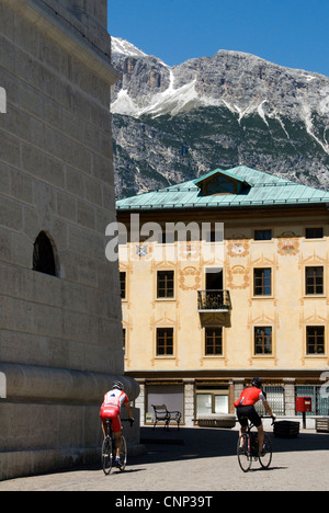 Cyclists in Cortina d'Ampezzo on the Corso Italia Stock Photo