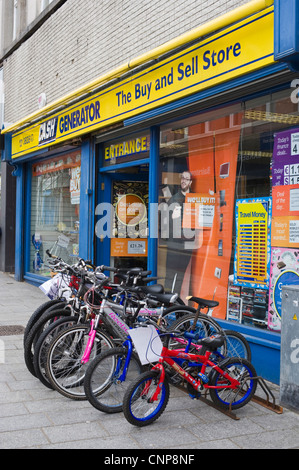 Exterior of CASH GENERATOR The Buy And Sell Store on high street in Merthyr Tydfil South Wales UK Stock Photo