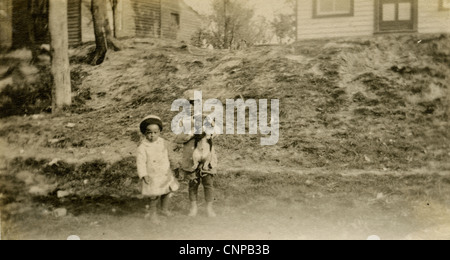 Circa 1910s photo of two young African-American children, possibly Boonville, Missouri. Stock Photo