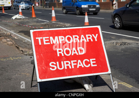 Temporary Road Surface Roadworks sign on UK motorway Stock Photo - Alamy