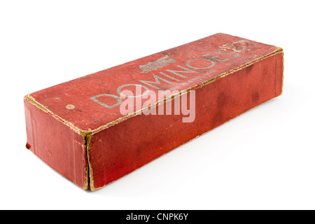 Old carboard dominos box over white Stock Photo