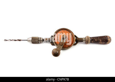 Old rusty hand drill over white Stock Photo