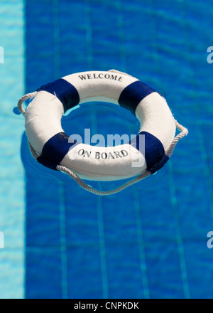 Welcome on board with life buoy in swimming pool Stock Photo