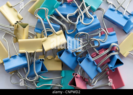 colors metal paperclips on white background Stock Photo