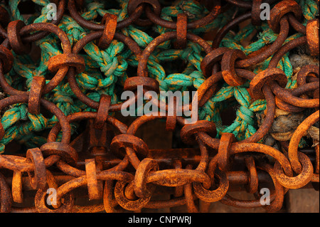 Chain links and ropes on scallop dredger boat fishing nets Stock Photo