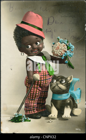 Germany in 1928. The old mail greeting card. The black boy with a cat and flowers. German Text: Happy Birthday! Stock Photo