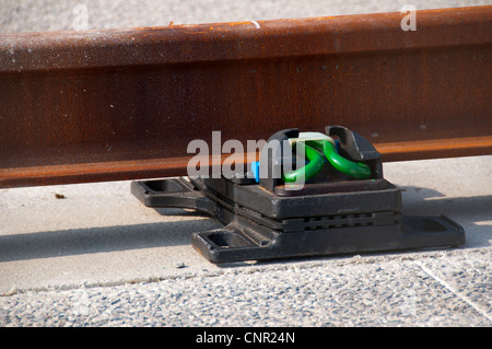 Pandrol Vipa rail fastening, used for noise reduction on the Metrolink East Manchester Line, Tameside, Manchester England, UK Stock Photo