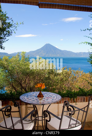 View from the villa at Casa Palopo Hotel, on the shores of Lake Atitlan, with San Pedro volcano in the background. Stock Photo