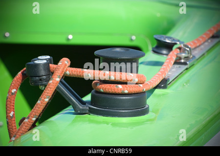 Capstan with sailboat rigging Stock Photo