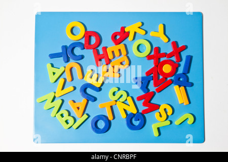 Letter magnets closeup on white background Stock Photo