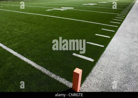 An American football with field yard lines background illustration. Vector  EPS 10 available Stock Photo - Alamy