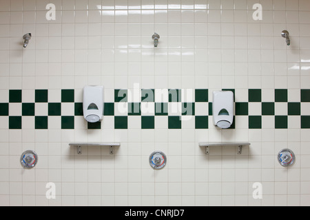 New black shower head on holder in white tiled bathroom in modern apartment  Stock Photo - Alamy