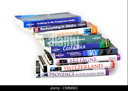 Collection showing assortment of travel guides and guidebooks about worldwide holiday destinations Stock Photo