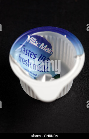 Empty or Used Takeaway Long Life Milk Pots Stock Photo