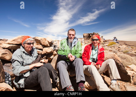 Trekkers on Guiliz peak in the Jebel Sirwa region of the Anti Atlas mountains of Morocco, North Africa. Stock Photo