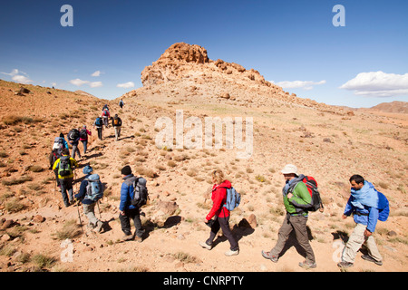 Trekkers in the Jebel Sirwa region of the Anti Atlas mountains of Morocco, North Africa. Stock Photo