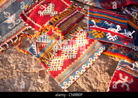 Berber Moroccan woven cloth rugs and bags in the Anti Atlas mountains of Morocco, North Africa. Stock Photo