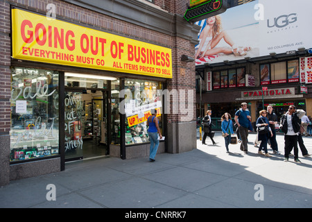 An electronics store on Broadway in Times Square in New York announces that it is soon going out of business Stock Photo