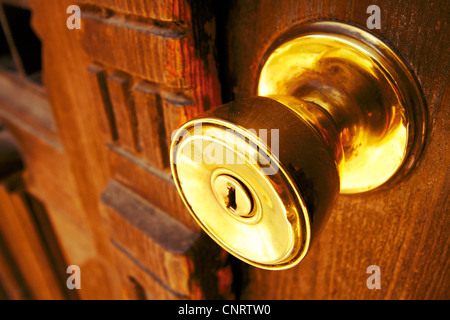golden knob security door that expresses strength Stock Photo