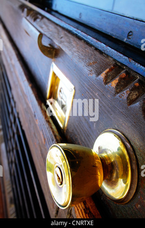 golden knob security door that expresses strength Stock Photo