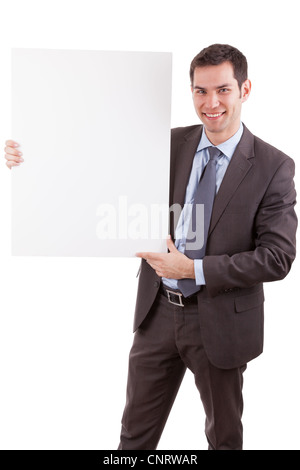 Young caucasian businessman holding a white board, isolated on whitebackground Stock Photo