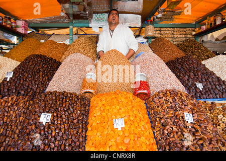 Dried nuts and fruit on a stand at a souk in Marrakech, Morocco, North Africa. Stock Photo