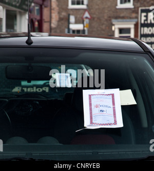 Parking tickets on car windscreens in York Stock Photo