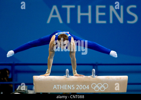 GYMNASTICS Paul Hamm (USA) competing on the pommel horse during the men's individual all around finals, where he won the gold Stock Photo