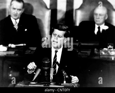Digitally restored vector photo of President John F. Kennedy addressing congress on sending man to the moon. Stock Photo