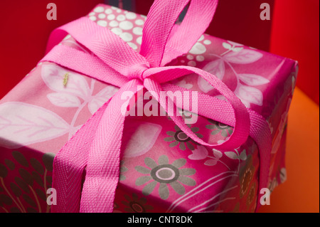 Festively wrapped gift Stock Photo