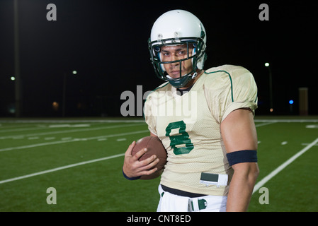 Football player on field, portrait Stock Photo