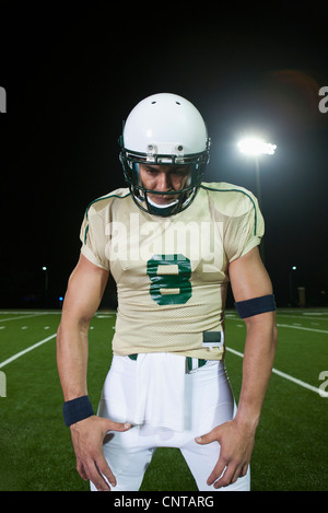 Football player on field, portrait Stock Photo