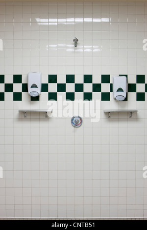 https://l450v.alamy.com/450v/cntb51/public-shower-room-with-soap-dispensers-on-wall-cntb51.jpg