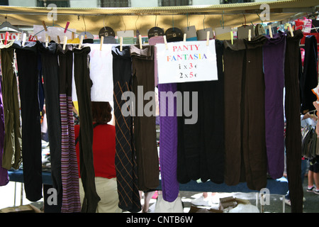 Tights for sale at El Rasto Europe's biggest outdoor market in Madrid Spain on a Sunday Morning Stock Photo