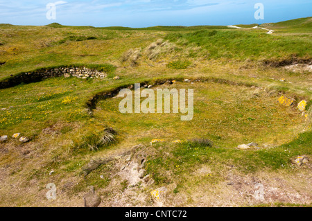 Cladh Hallan roundhouses on the island of South Uist in the Outer Hebrides. Stock Photo