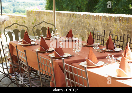 Table settings outdoors Stock Photo