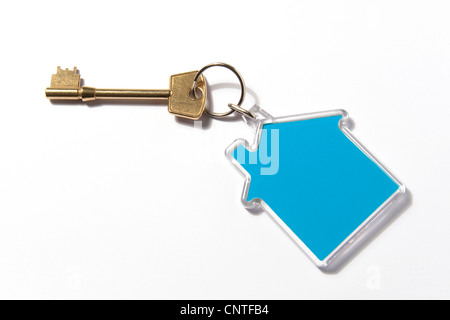 house shaped key ring fob on white background Stock Photo
