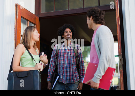 Students talking on campus Stock Photo