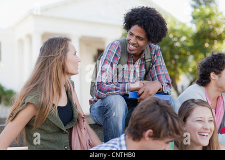 Students talking on campus Stock Photo