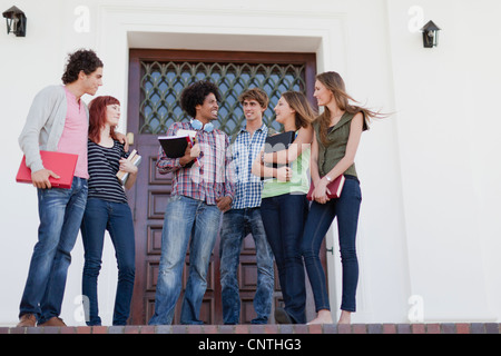 Students talking on campus Stock Photo