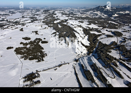 Oberallgaeu in Winter with cross-country ski run South of Rottachberg, above a frozen lake Rottach, Germany, Bavaria, Allgaeu Stock Photo