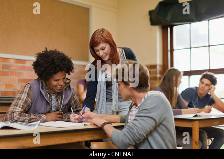 Students working together in class Stock Photo