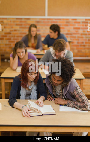 Students working together in class Stock Photo