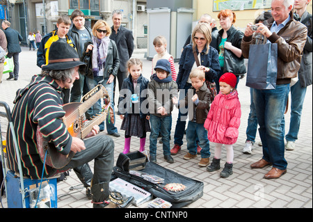 Street musician in Old Arbat street in Moscow Russia, taken on April 2012 Stock Photo