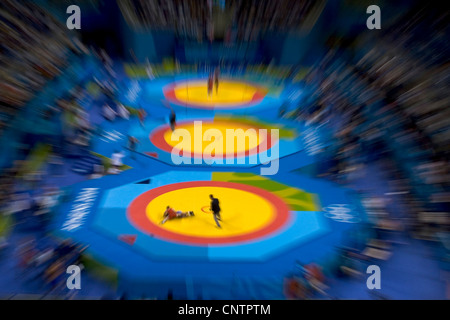 Zoom blur image of Greco Roman wrestlers in action Stock Photo