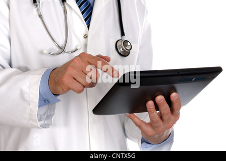 Doctor using digital tablet Stock Photo